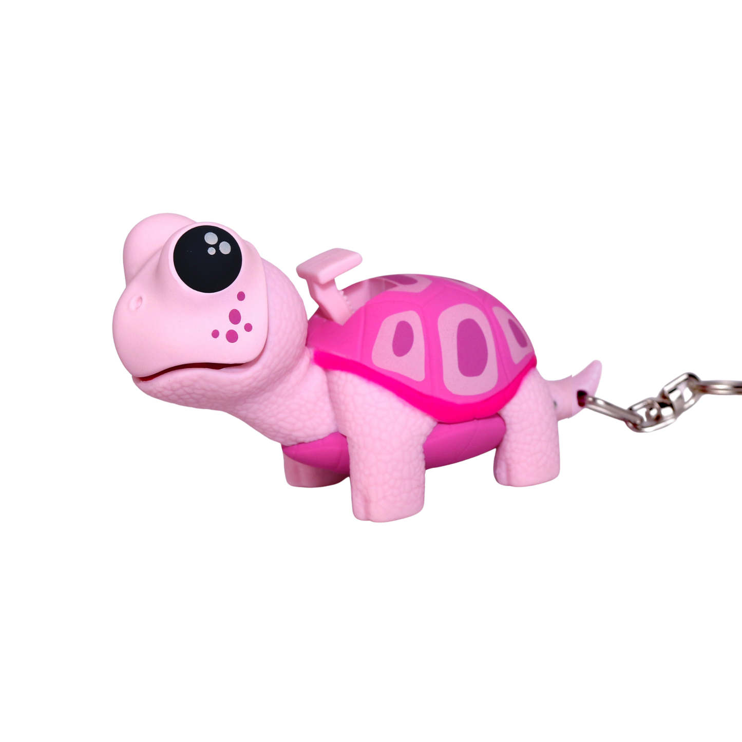 Pink turtle-shaped keychain with a keyring on a white background